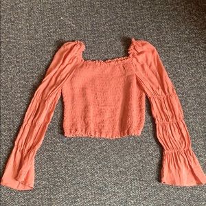 Orange peasant top with bell sleeves